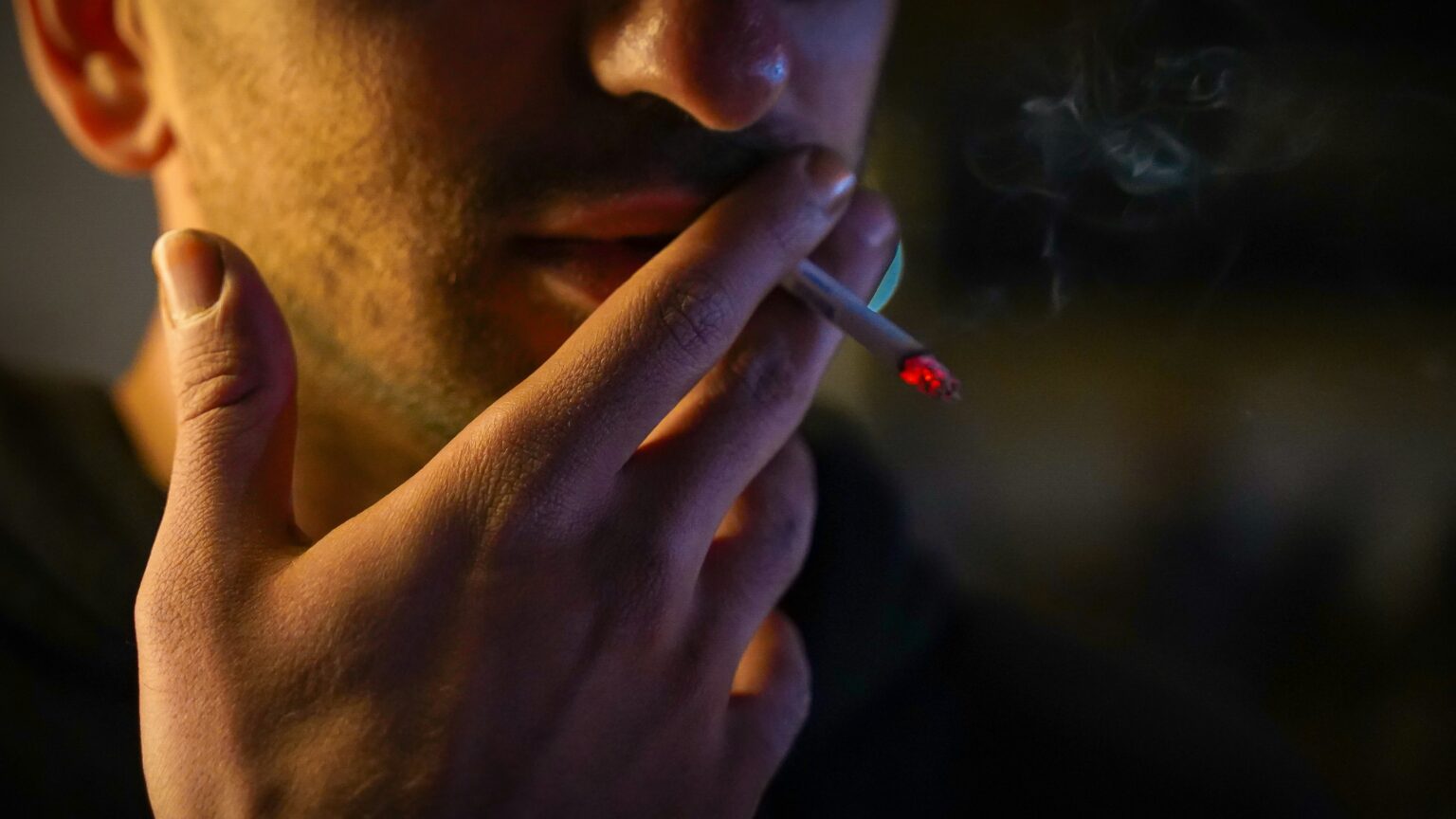 Man smoking cigarettes