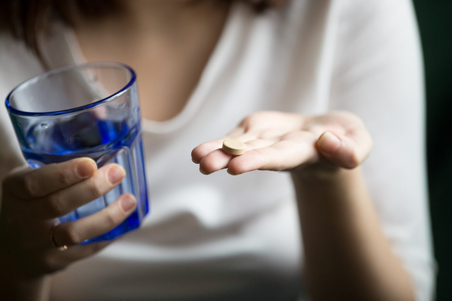 Female Hands Holding Pill Glass Water