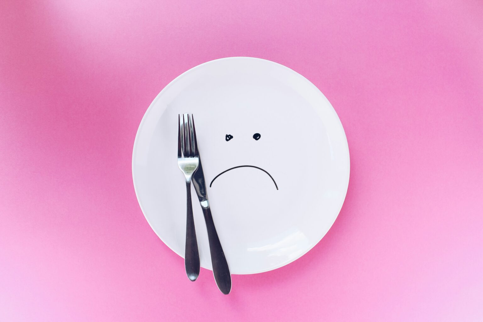 Sad plate with fork and knife Sad plate with fork and knife